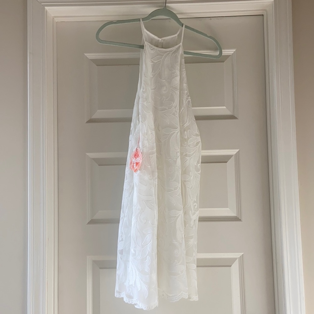 Never worn - white dress.